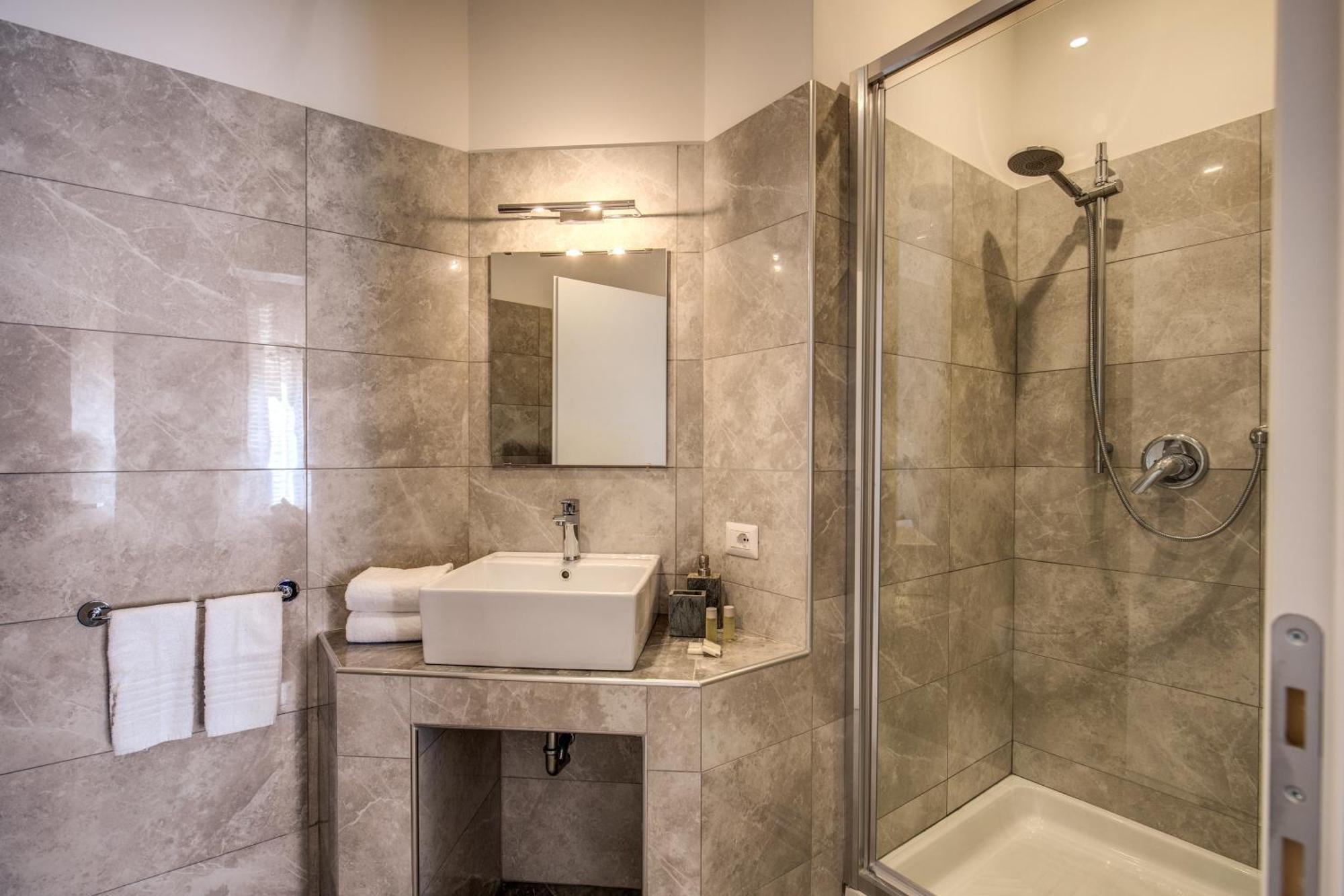 Elysium Suites Collection Rom Rum bild